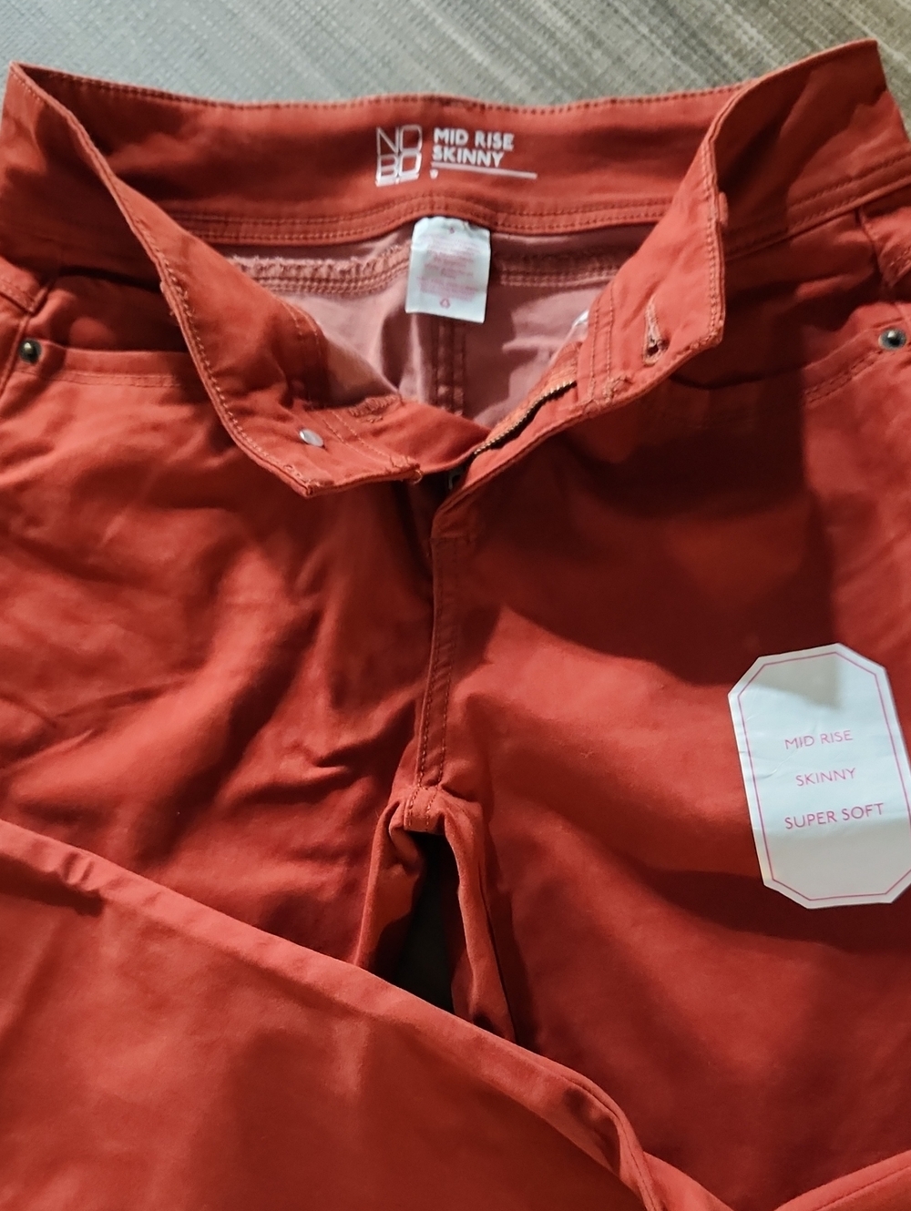 No Bo Mid Rise Skinny Jeans in Rust Red